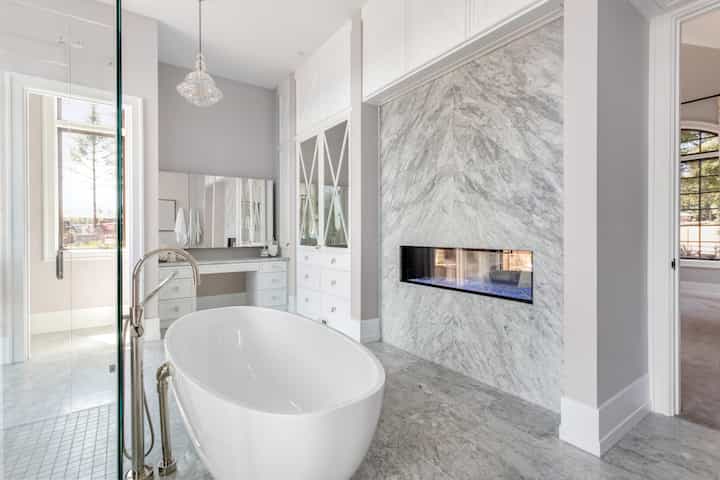 Luxurious bathtub installation with custom fireplace in Bloomington, Indiana
