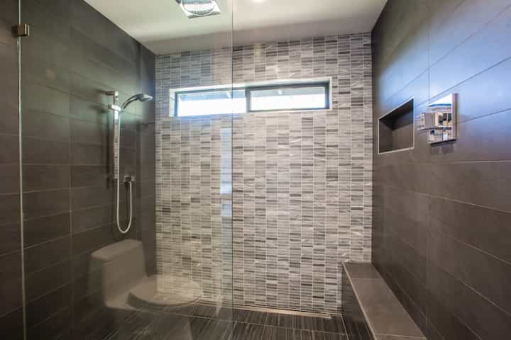 A country home inspired shower installation by local contractors in Bloomington, Indiana